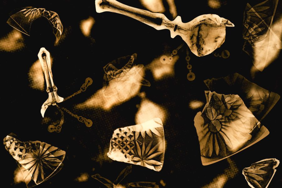 image of smashed crystal bells with pieces located across the image. The clappers from two of the bells are pictured in multiple positions to suggest movement. The background of the image contains a close up view of liver cells